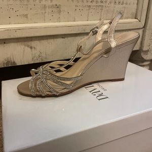 Worn once, David’s bridal champagne wedge heel